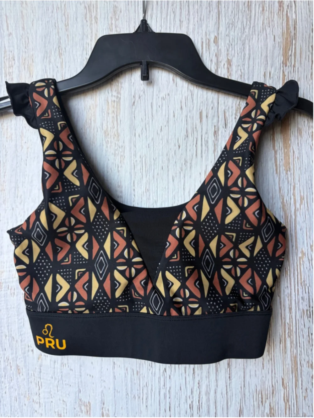 Women's Pru Apparel Sports Bra Size S Black Orange Geometric Print